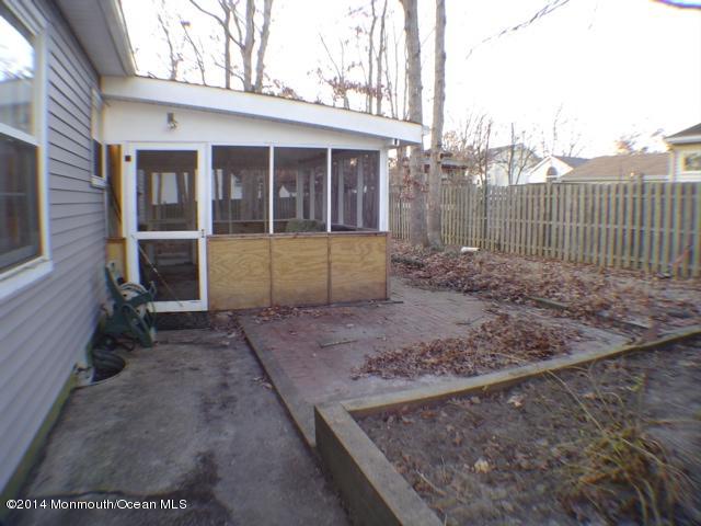 240 Crows Nest Road Manahawkin, NJ 08050 - Photo 23 of 26 a view of a house with a backyard