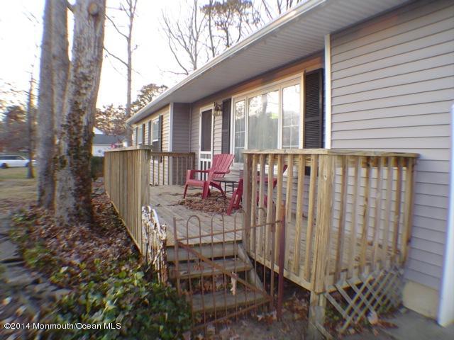 240 Crows Nest Road Manahawkin, NJ 08050 - Photo 26 of 26 a view of a patio with a table chairs and backyard