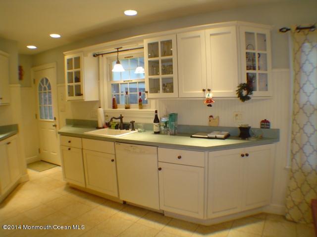 240 Crows Nest Road Manahawkin, NJ 08050 - Photo 6 of 26 a bathroom with a granite countertop sink mirror and double