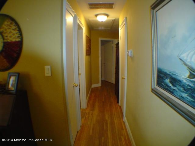 240 Crows Nest Road Manahawkin, NJ 08050 - Photo 10 of 26 a view of a bathroom from a hallway