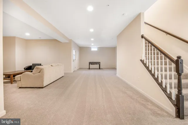 a room with furniture and a wooden floor