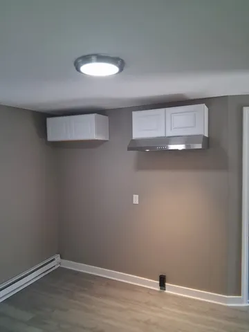 an empty room with a workbench