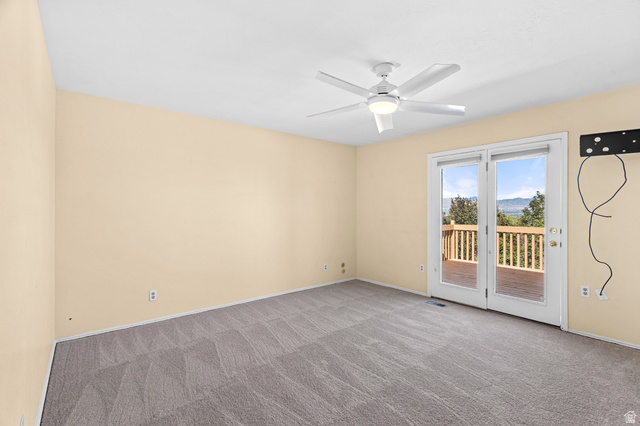 11934 South Cedar Ridge Road Sandy, UT 84094 - Photo 16 of 58 Light-toned walls complement patterned carpeting
