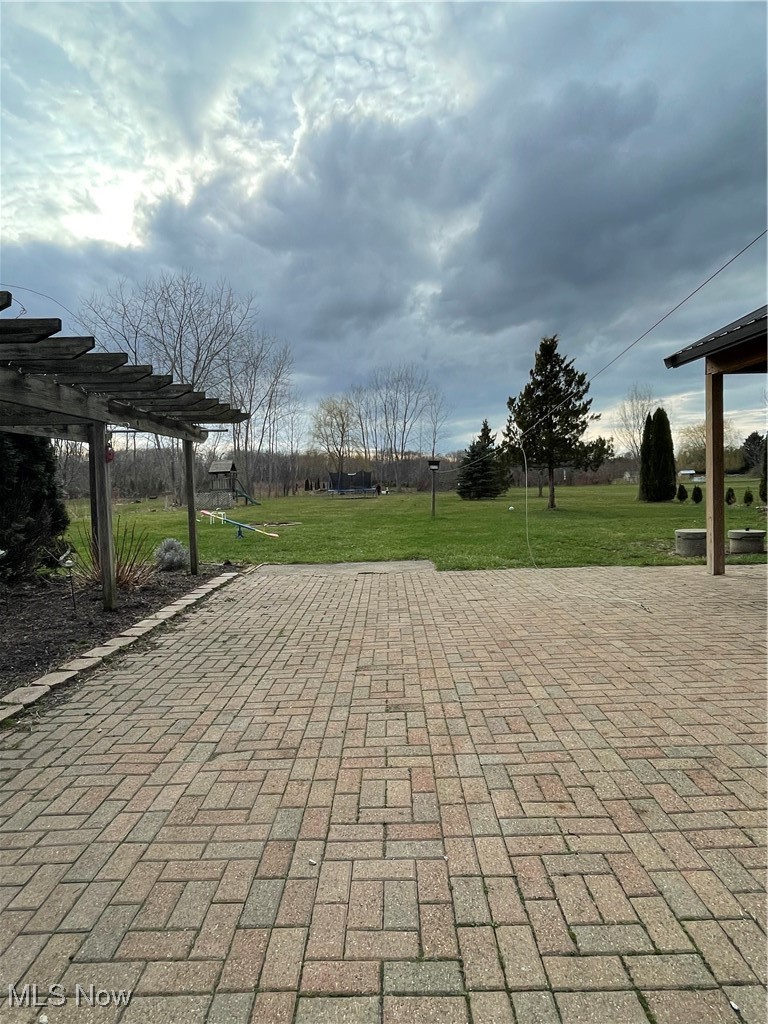 3158 Bates Road Madison, OH 44057 - Photo 5 of 22 View of patio / terrace featuring a pergola