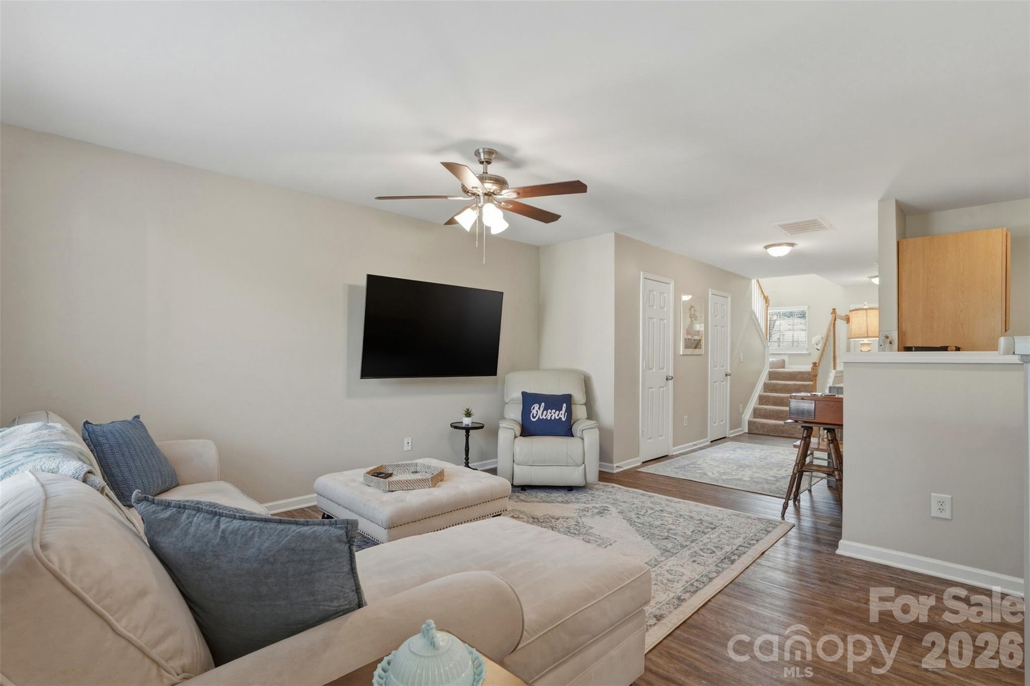 2262 Hanover Drive Fort Mill, SC 29707 - Photo 12 of 26 a living room with furniture and a flat screen tv