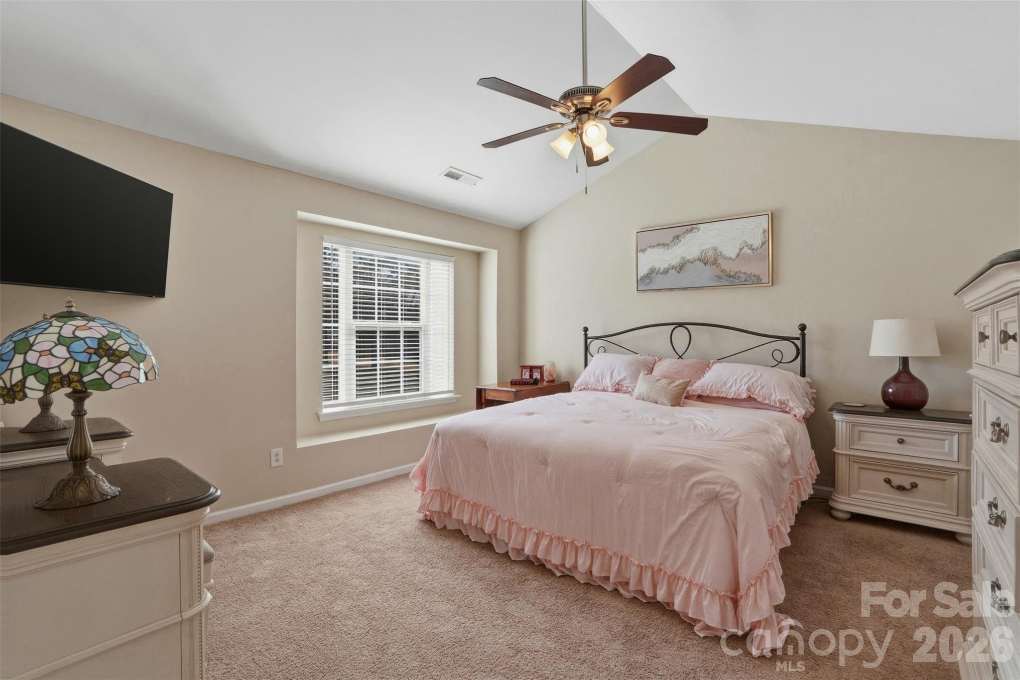 2262 Hanover Drive Fort Mill, SC 29707 - Photo 13 of 26 a bedroom with a bed and a flat screen tv