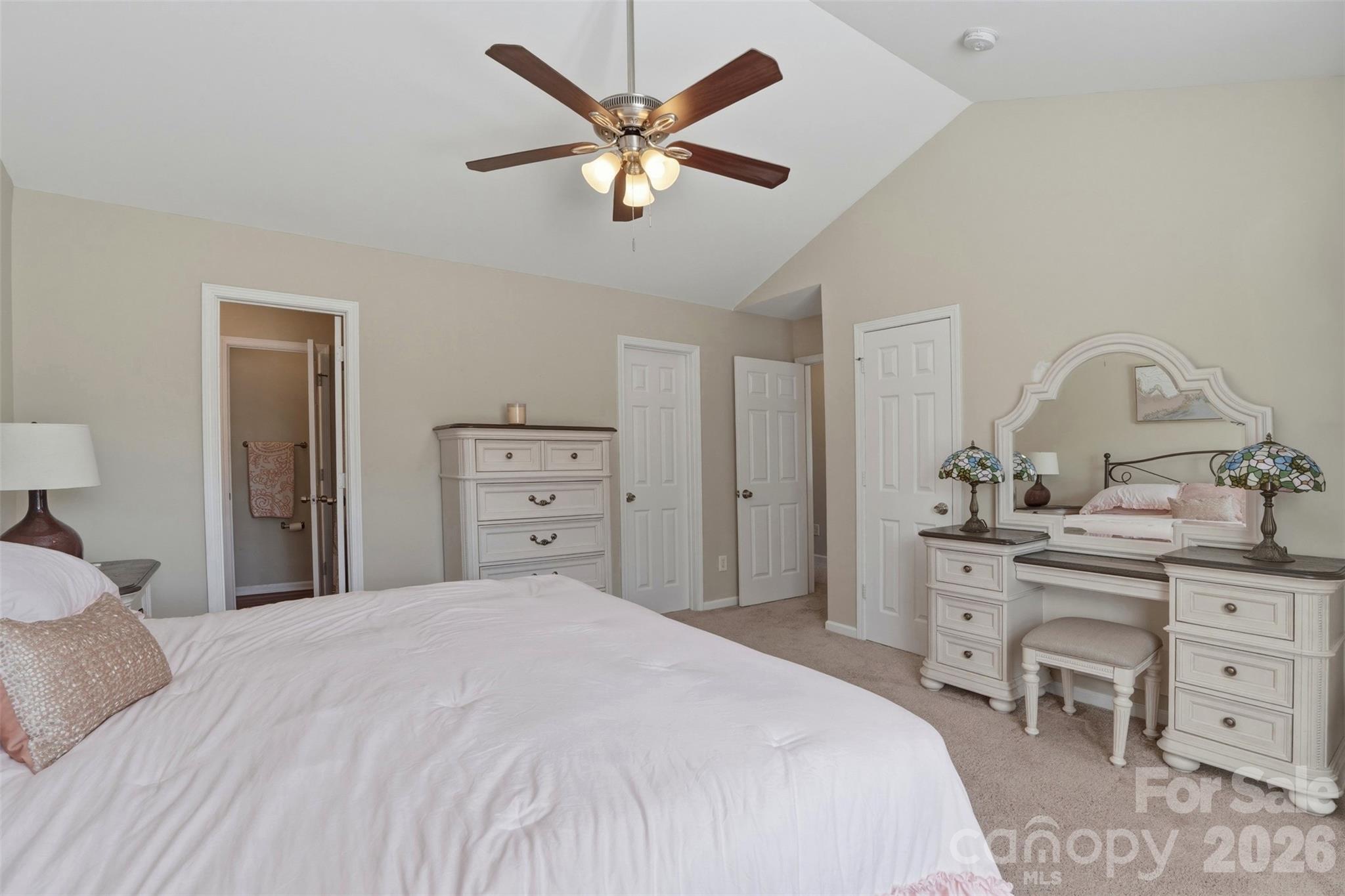 2262 Hanover Drive Fort Mill, SC 29707 - Photo 15 of 26 a bedroom with a bed and a dresser