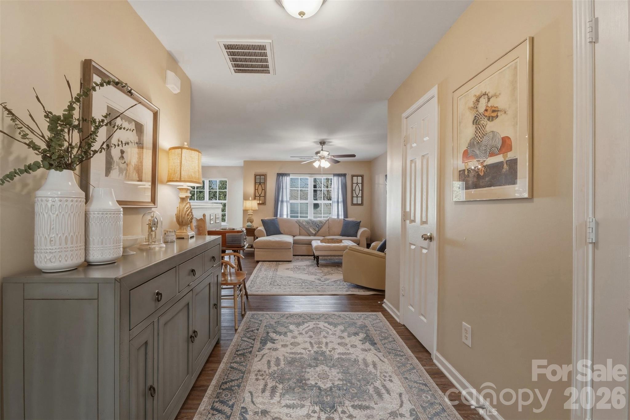 2262 Hanover Drive Fort Mill, SC 29707 - Photo 2 of 26 a living room with furniture and a painting on the wall