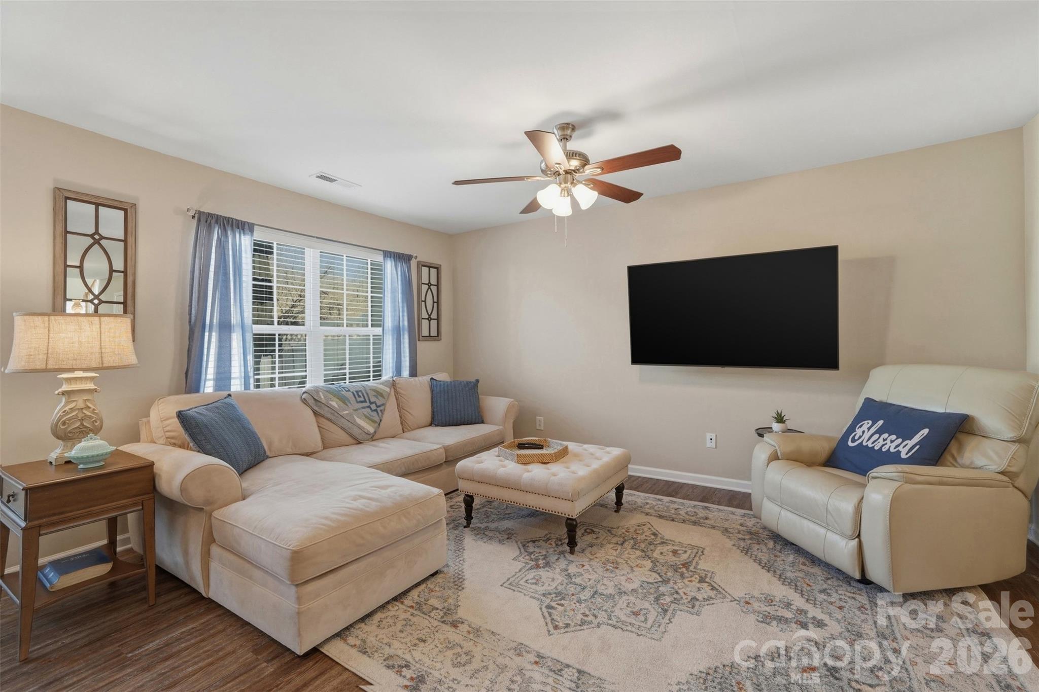 2262 Hanover Drive Fort Mill, SC 29707 - Photo 4 of 26 a living room with furniture and a flat screen tv