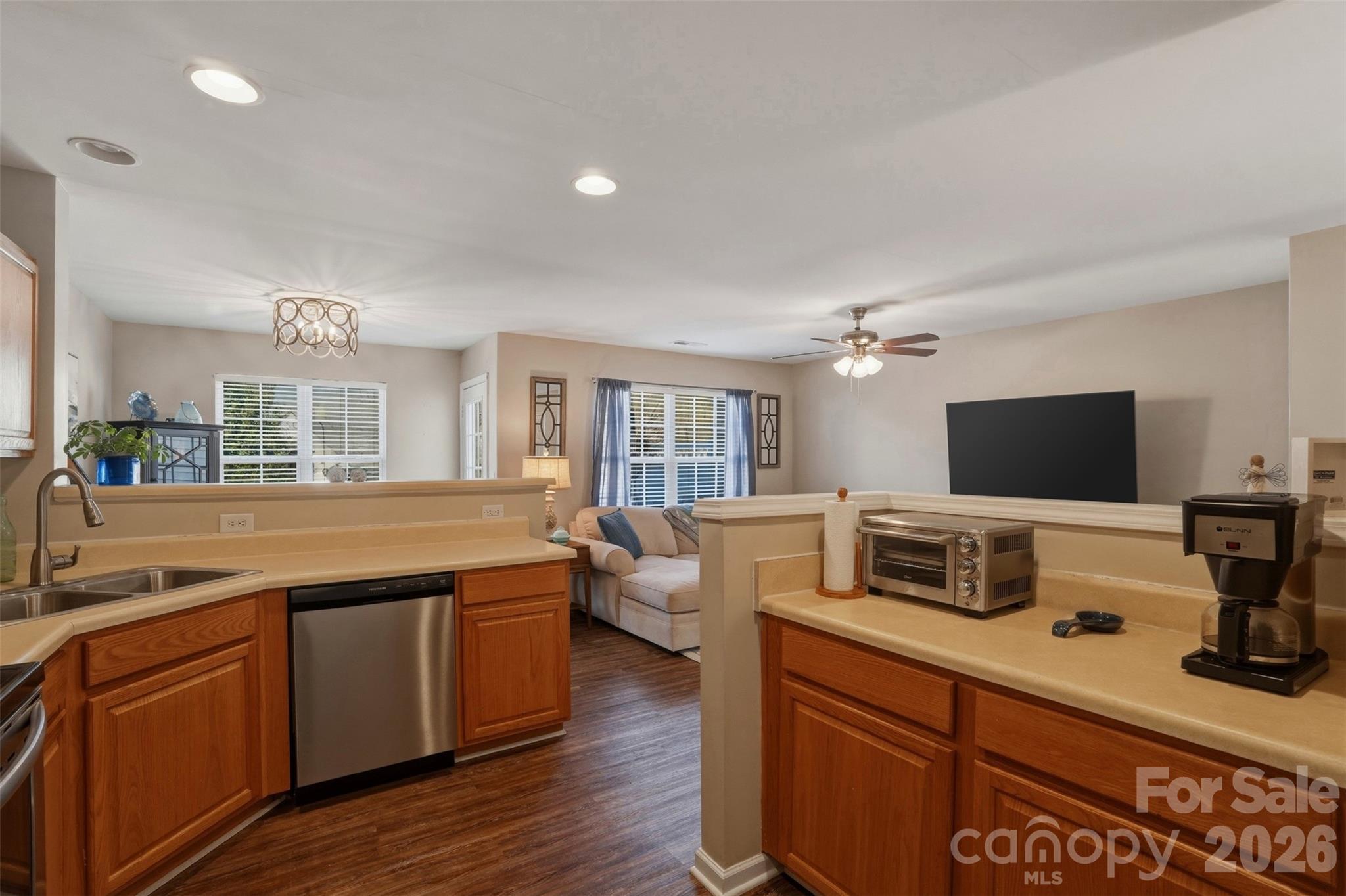 2262 Hanover Drive Fort Mill, SC 29707 - Photo 8 of 26 a kitchen with stainless steel appliances granite countertop a sink and a stove