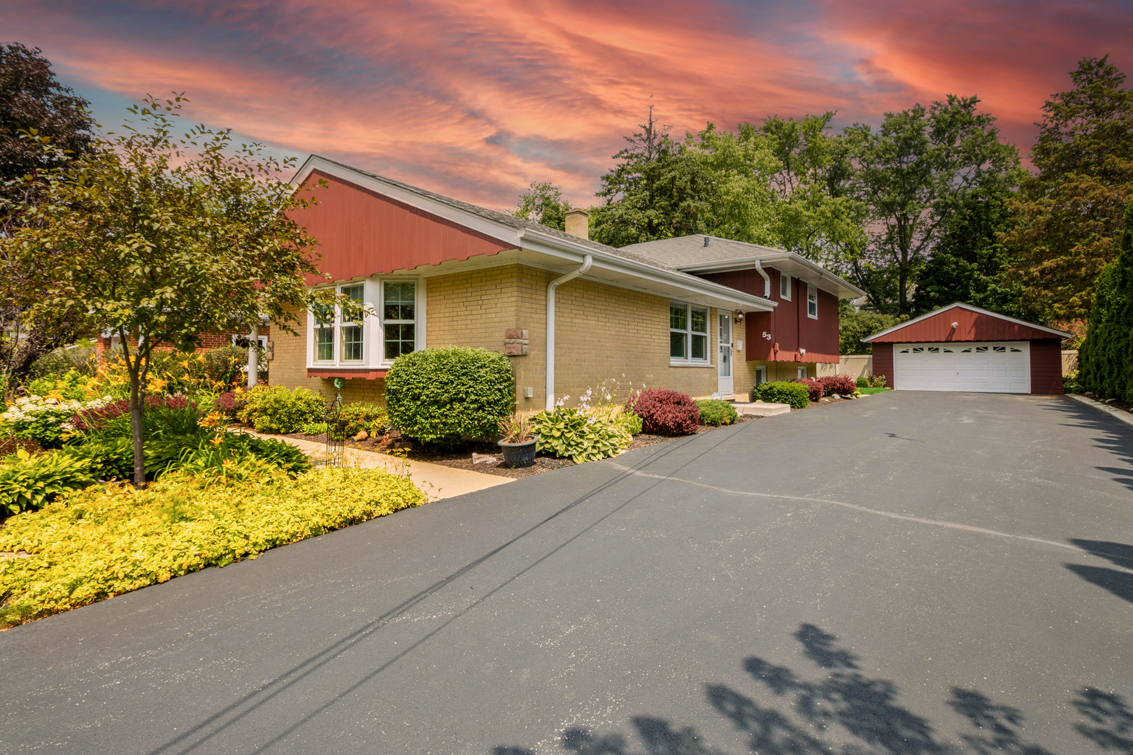 front view of a house with a street