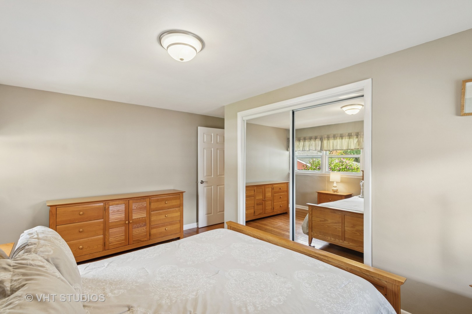 53 North Main Street Glen Ellyn, IL 60137 - Photo 14 of 30 a bedroom with a bed and a window