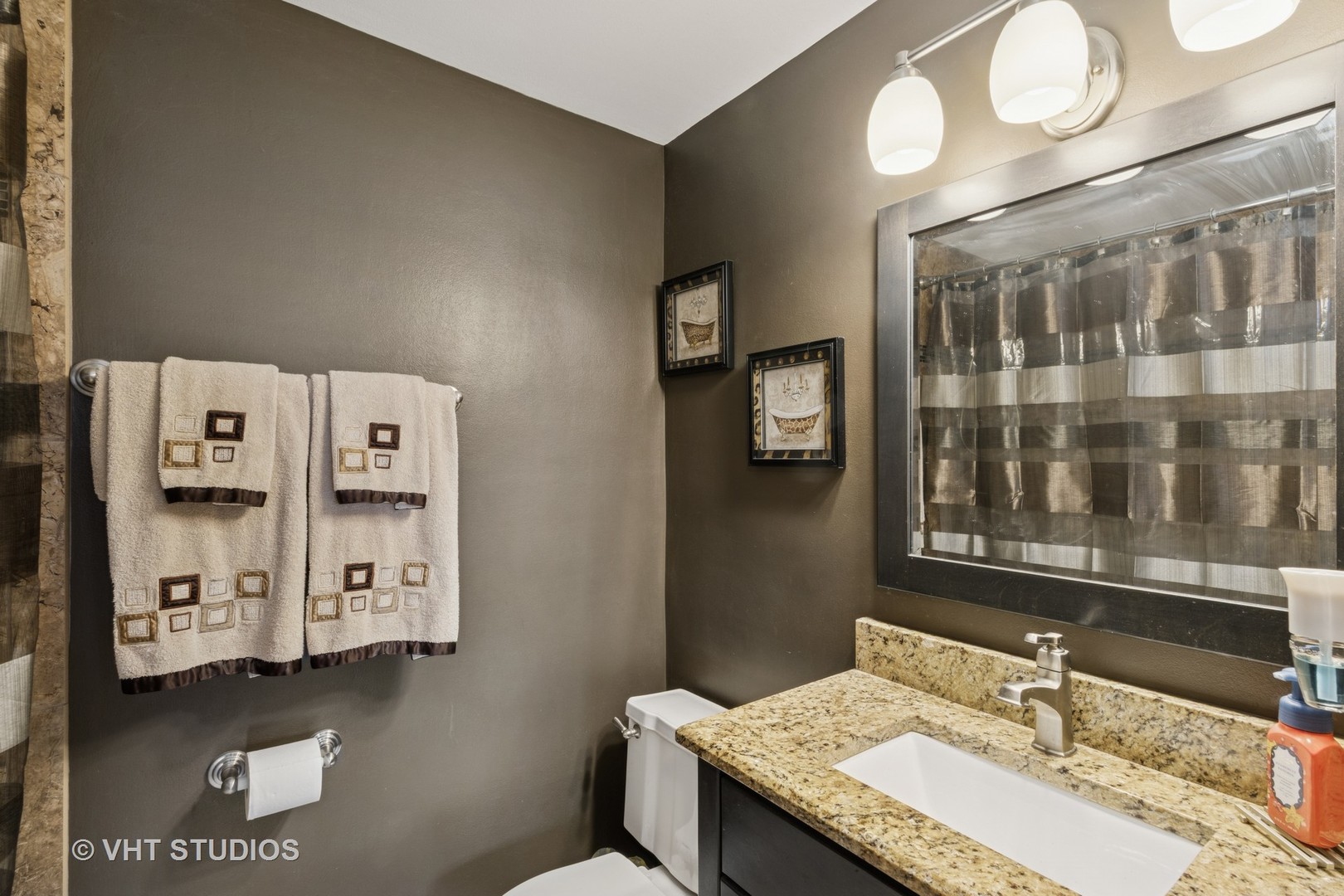 53 North Main Street Glen Ellyn, IL 60137 - Photo 15 of 30 a bathroom with a granite countertop sink and a mirror