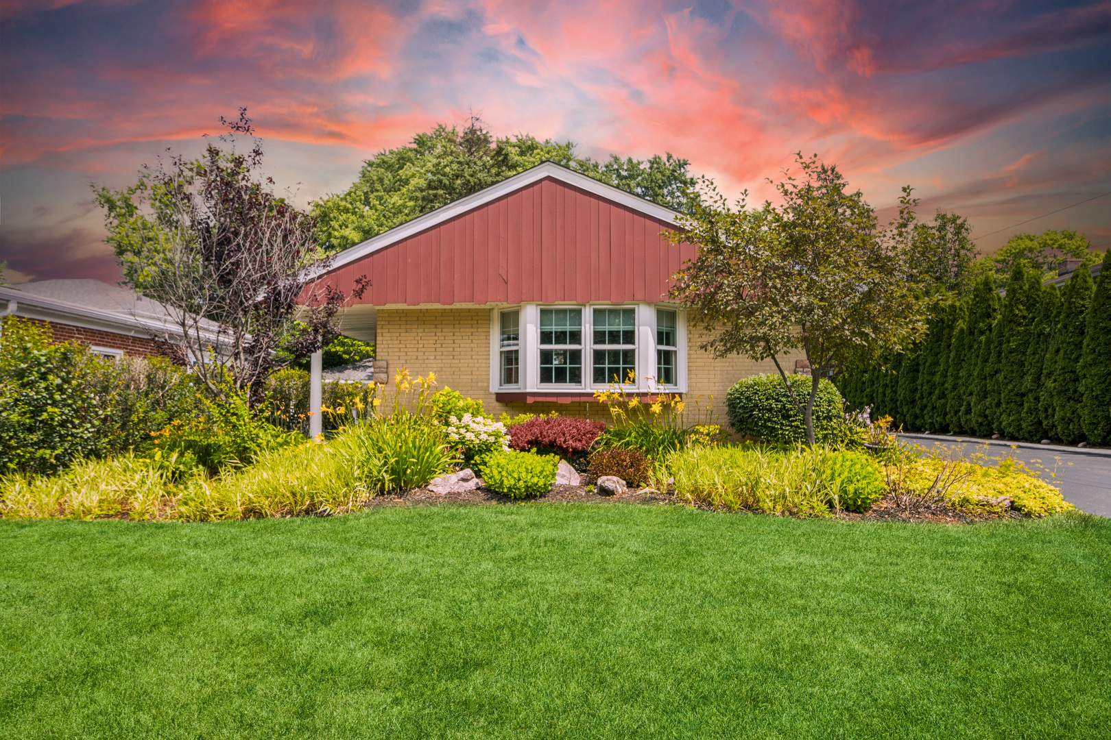53 North Main Street Glen Ellyn, IL 60137 - Photo 2 of 30 a view of a house with a yard and potted plants