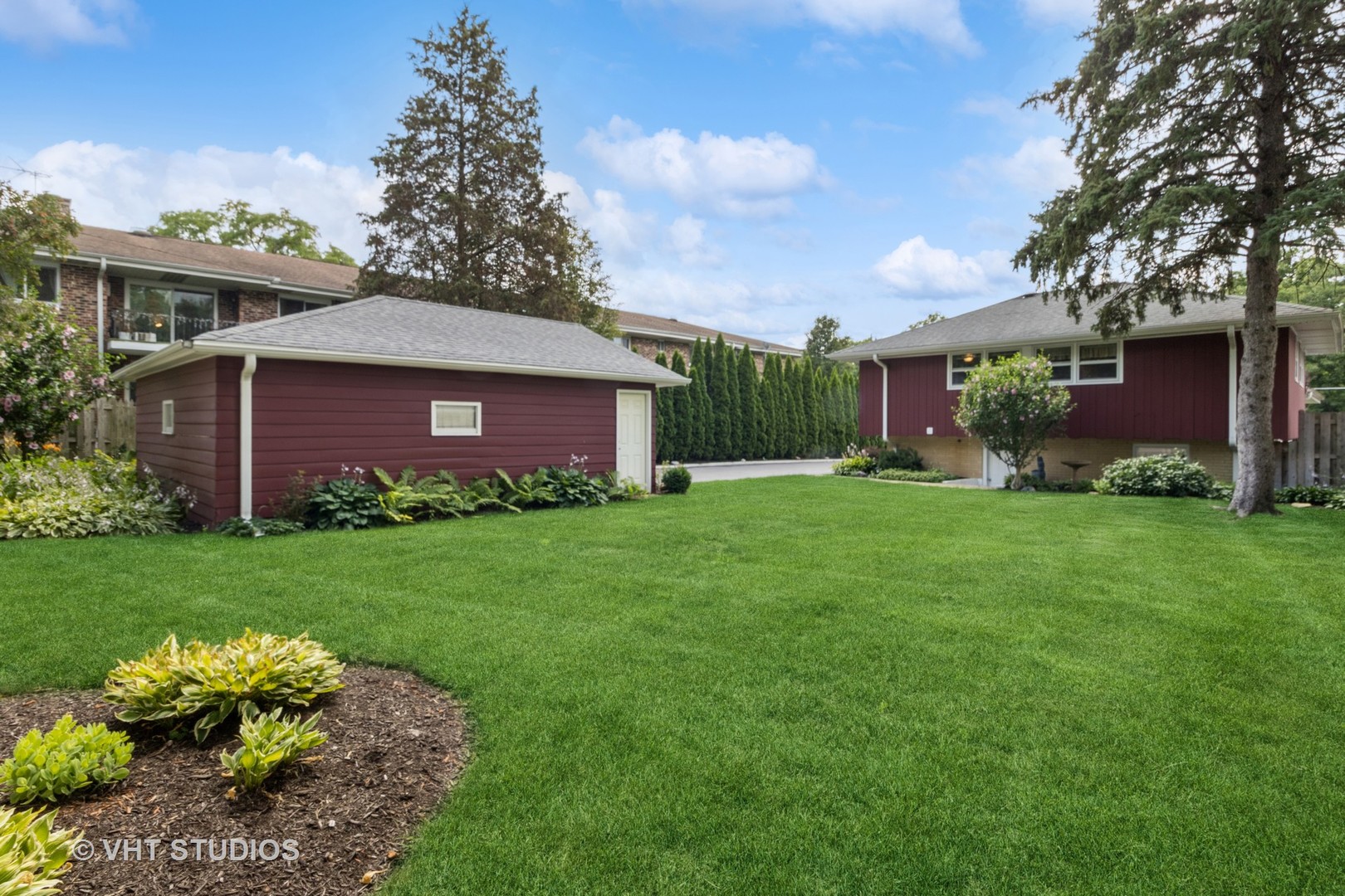 53 North Main Street Glen Ellyn, IL 60137 - Photo 23 of 30 a front view of house with a garden