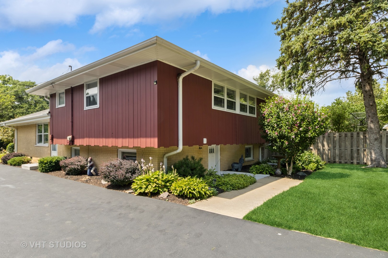 53 North Main Street Glen Ellyn, IL 60137 - Photo 24 of 30 a front view of a house with a garden