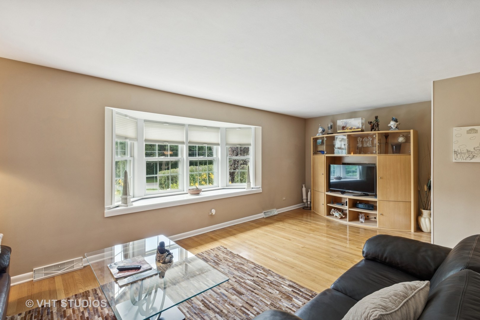 53 North Main Street Glen Ellyn, IL 60137 - Photo 6 of 30 a living room with furniture and a window