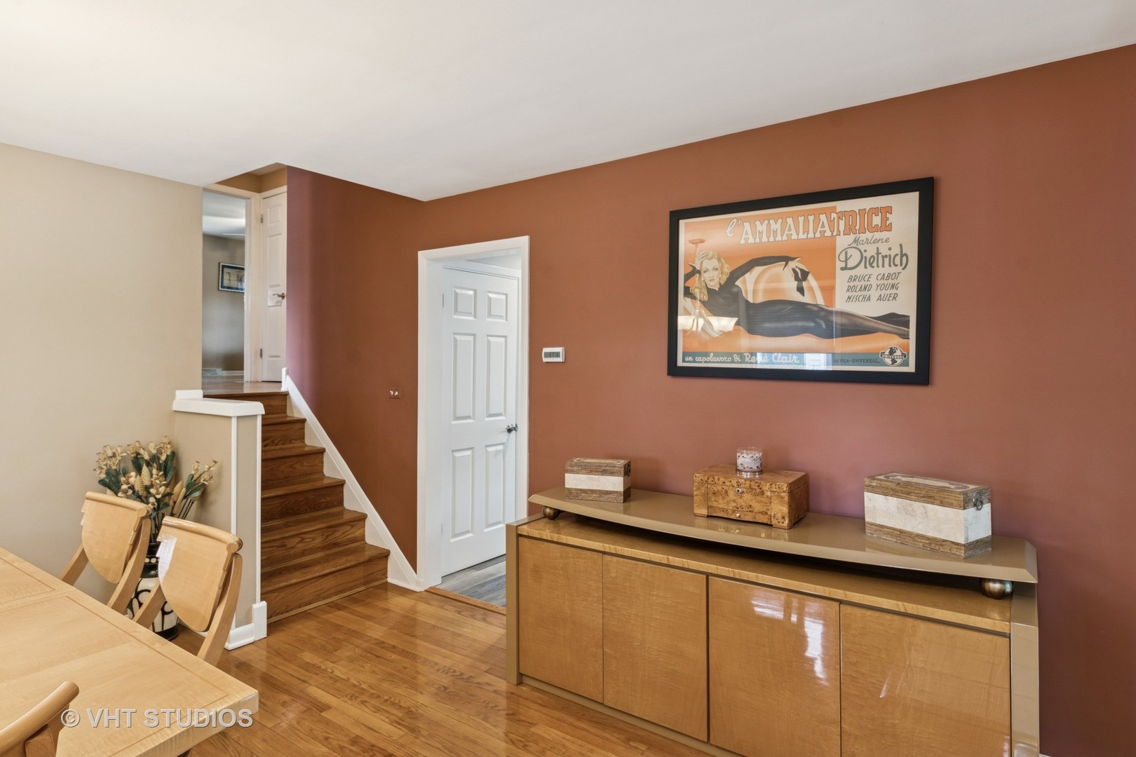 53 North Main Street Glen Ellyn, IL 60137 - Photo 9 of 30 a hallway with a sink and cabinets