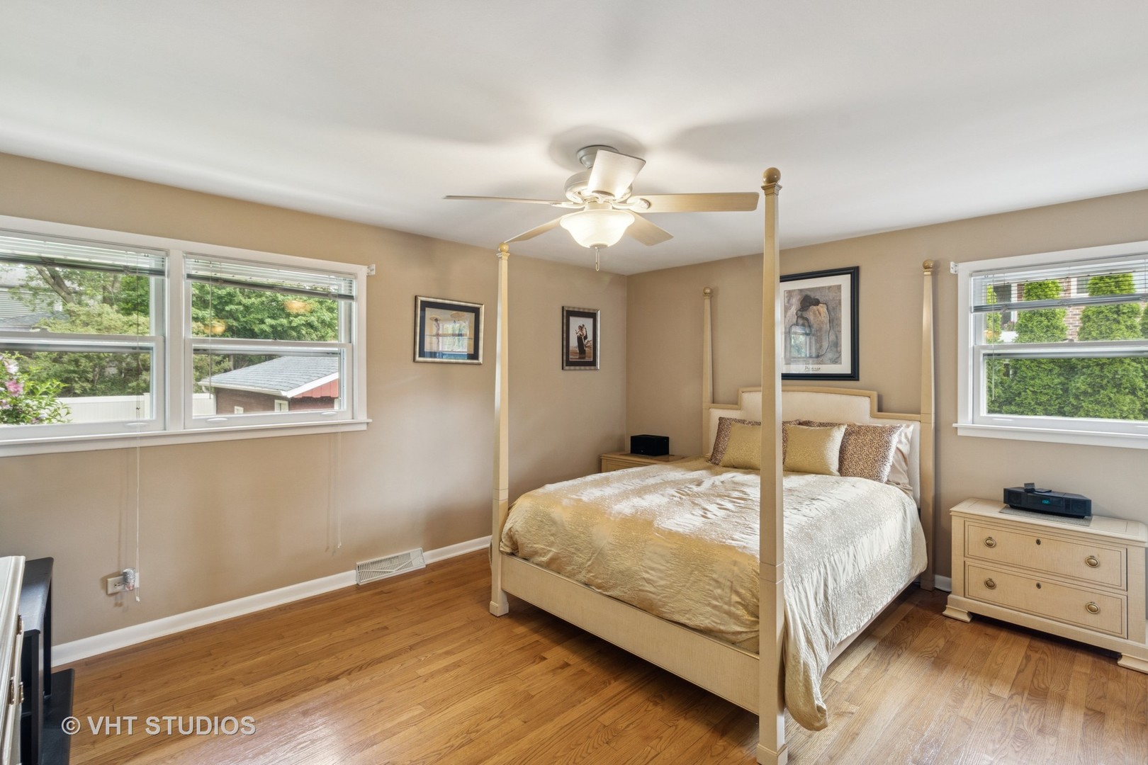 53 North Main Street Glen Ellyn, IL 60137 - Photo 10 of 30 a bedroom with a bed chandelier and a window