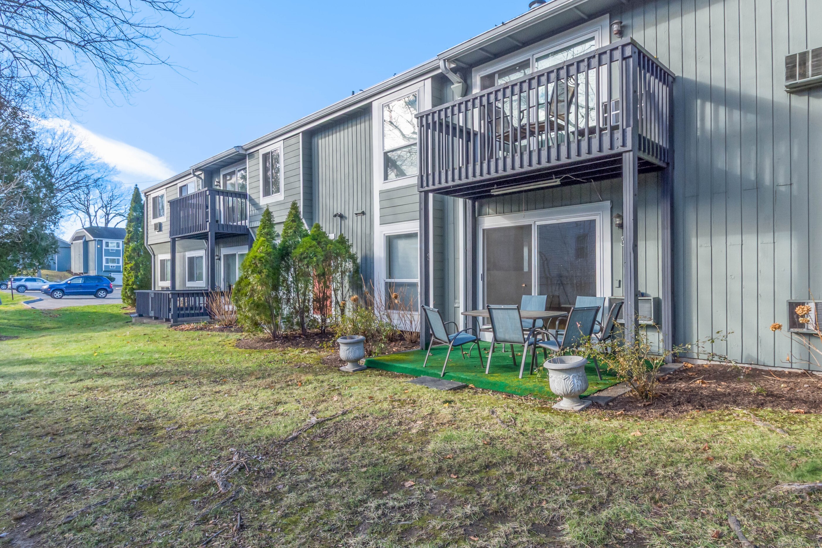 533 Glendale Avenue, Unit 533 Bridgeport, CT 06606 - Photo 14 of 15 a view of an house with backyard porch and sitting area