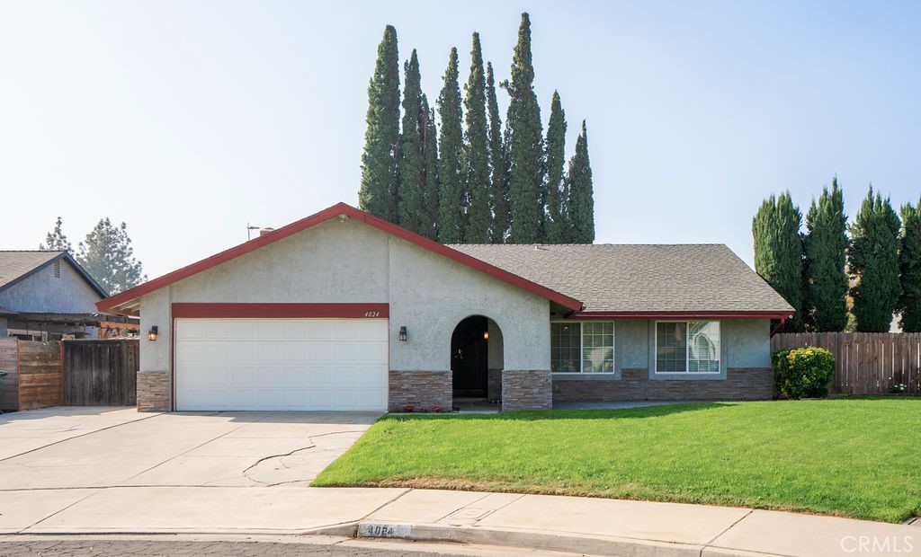 4024 Ballad Place Riverside, CA 92505 - Photo 1 of 1 a front view of a house with garden