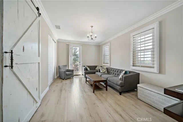 an aerial view of residential house with outdoor space and parking