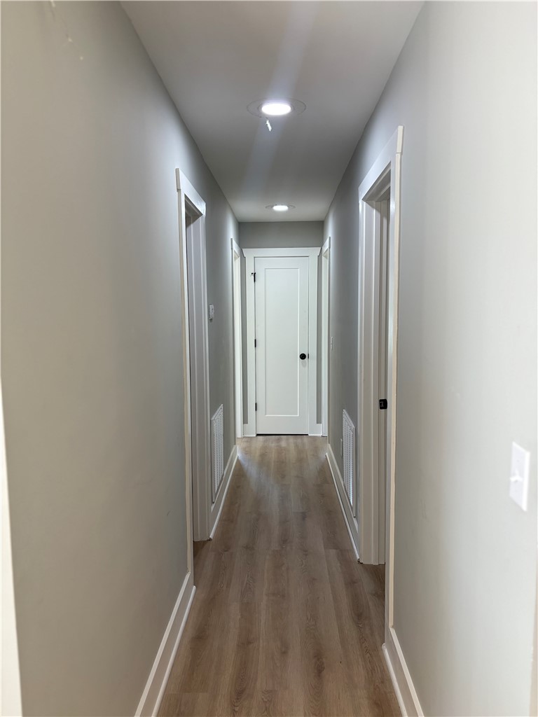 351 Randys Road Westminster, SC 29693 - Photo 18 of 30 A well-lit corridor with recessed lighting guides residents through this dwelling.