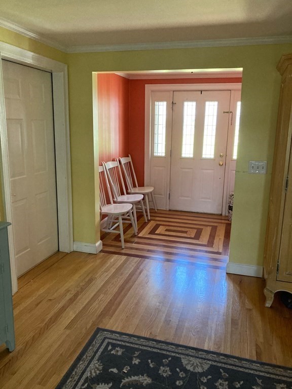 172 Sterling Road Lancaster, MA 01523 - Photo 7 of 41 a view of a room with wooden floor and chair