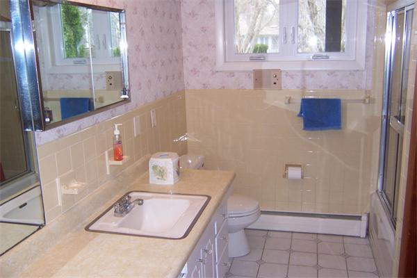 47 Bay Shore Road Barnstable, MA 02601 - Photo 12 of 22 a bathroom with a sink a toilet and a mirror