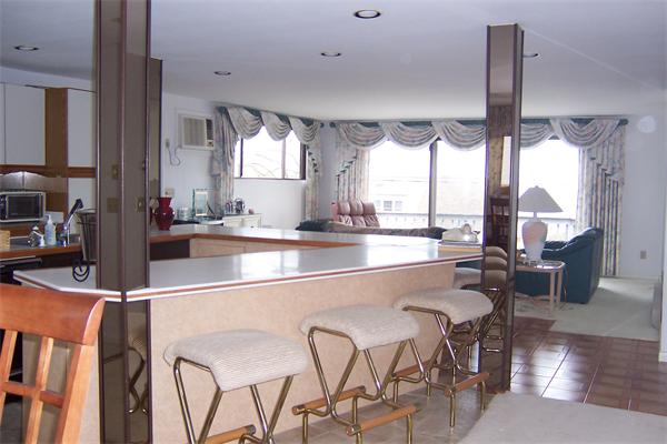47 Bay Shore Road Barnstable, MA 02601 - Photo 3 of 22 a dining table with chairs and window