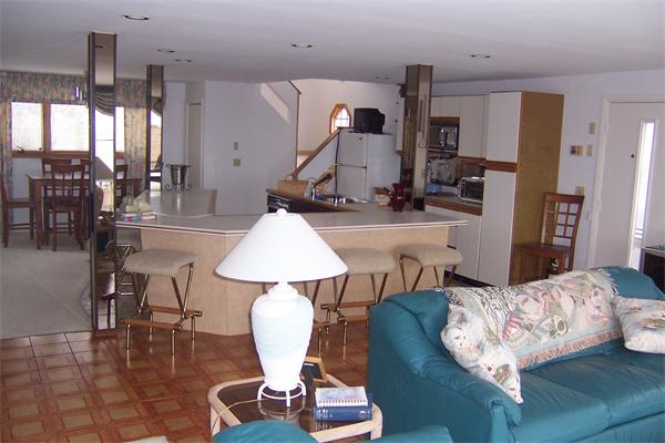 47 Bay Shore Road Barnstable, MA 02601 - Photo 5 of 22 a living room with furniture and wooden floor