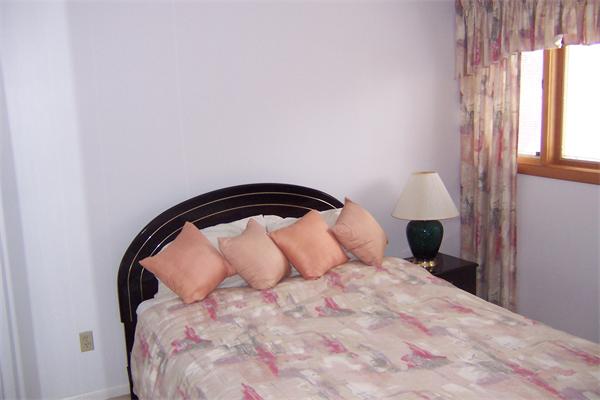 47 Bay Shore Road Barnstable, MA 02601 - Photo 8 of 22 a bedroom with a bed and a window