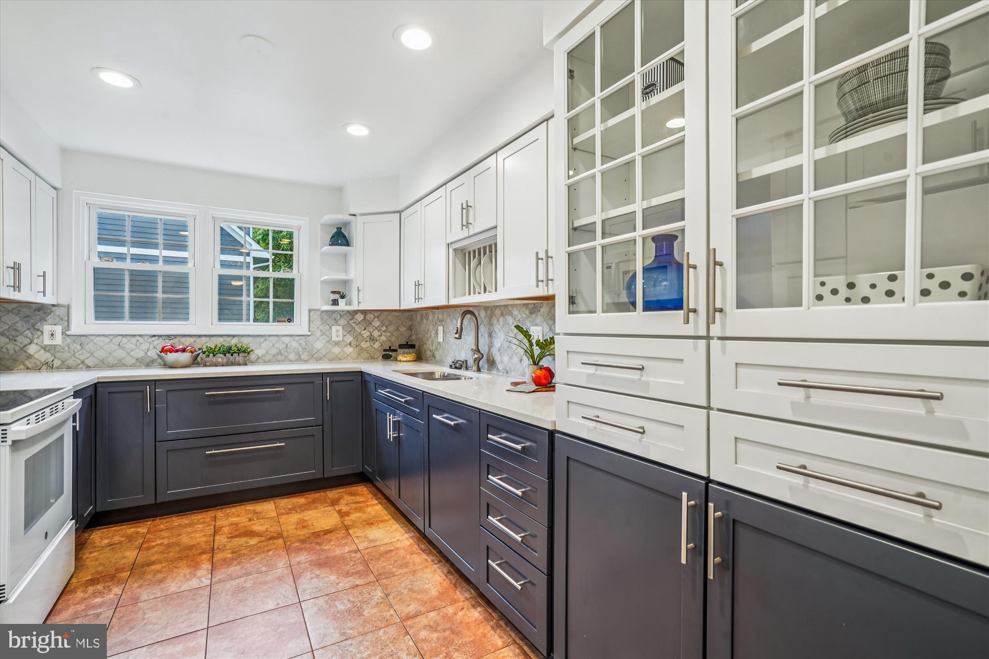 24 South Abingdon Street Arlington, VA 22204 - Photo 13 of 66 a kitchen with granite countertop stainless steel appliances and sink