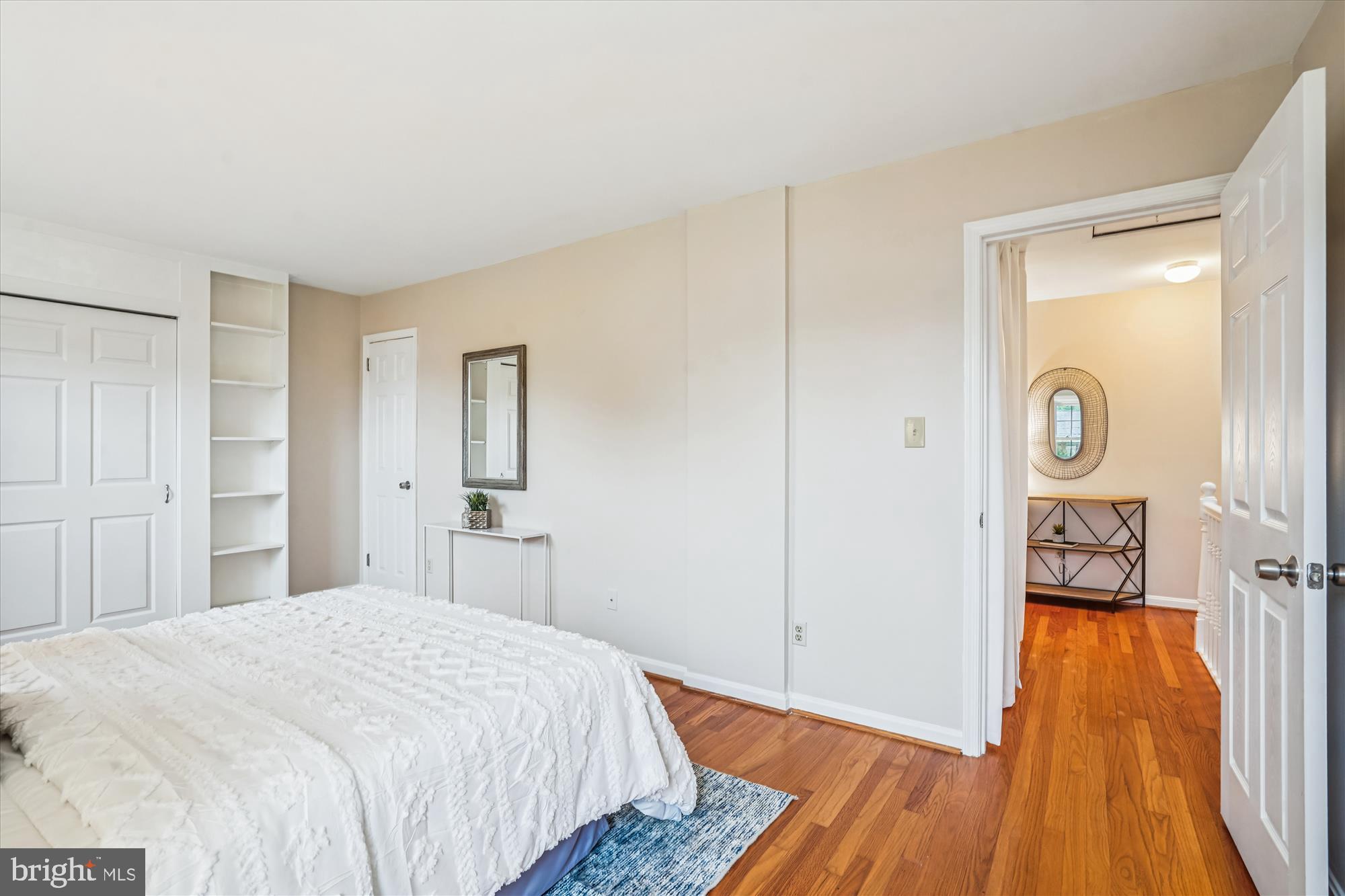 24 South Abingdon Street Arlington, VA 22204 - Photo 21 of 66 a bedroom with a bed and wooden floor
