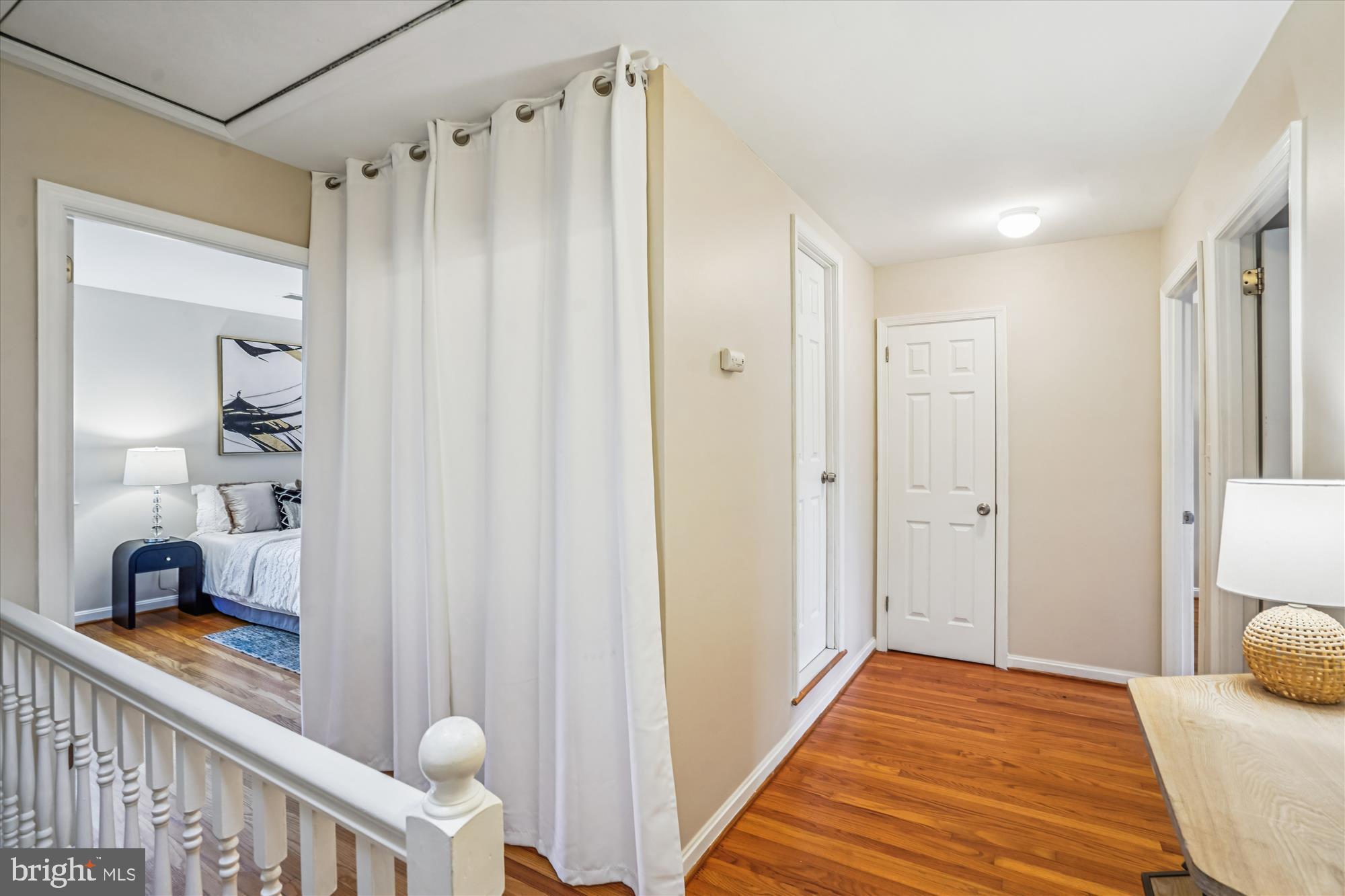 24 South Abingdon Street Arlington, VA 22204 - Photo 24 of 66 a bedroom with a bed and a book shelf