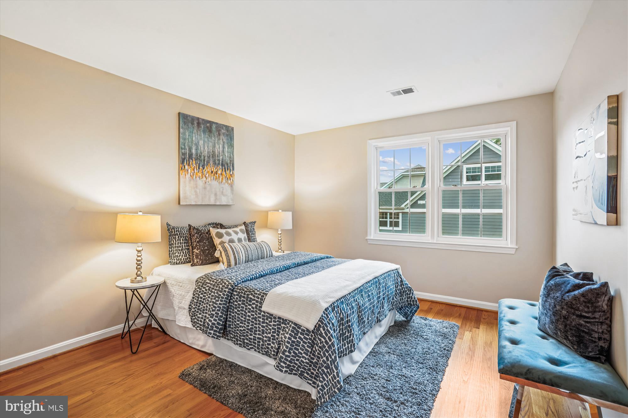 24 South Abingdon Street Arlington, VA 22204 - Photo 26 of 66 a bedroom with a bed and wooden floor