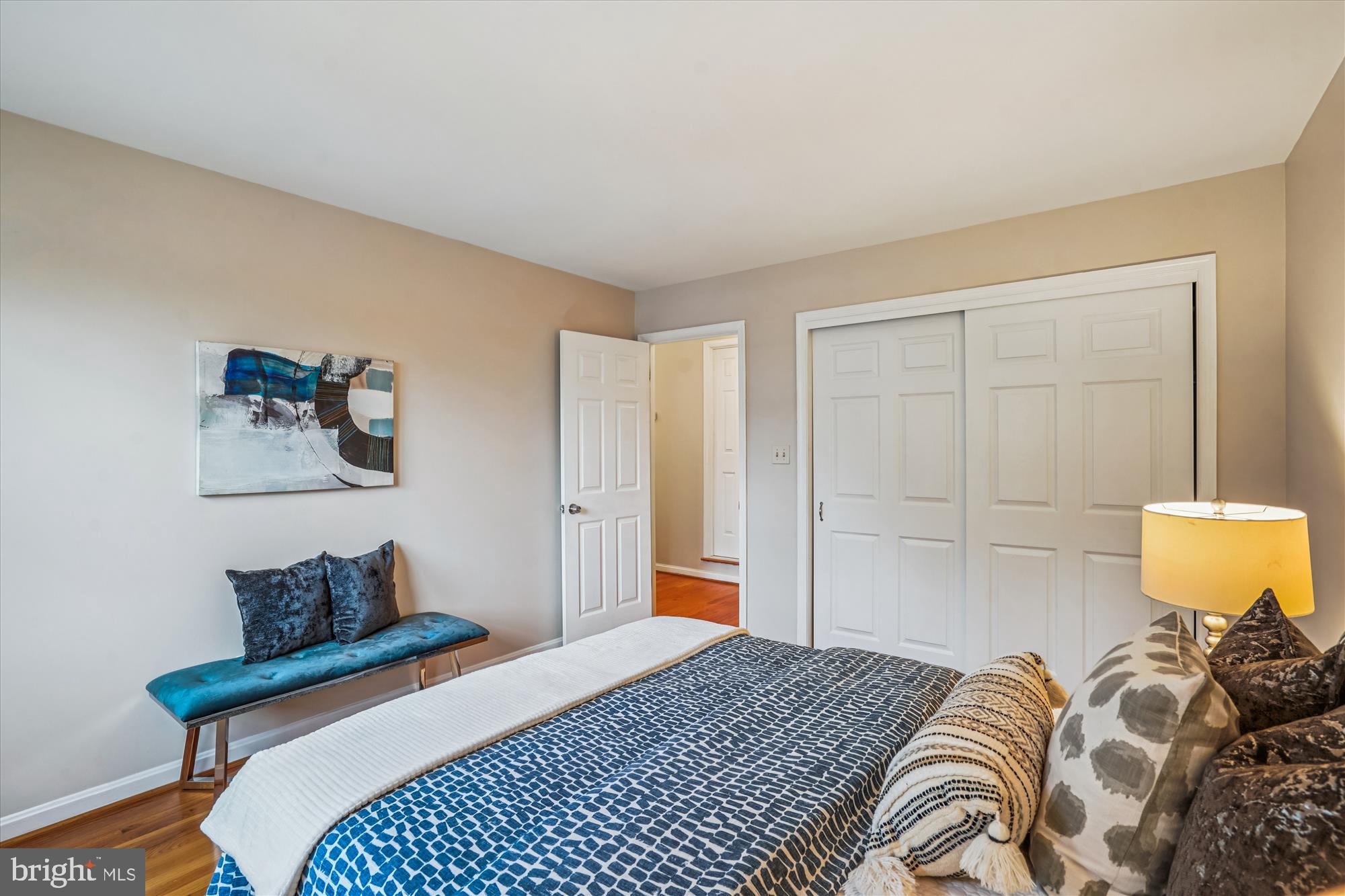 24 South Abingdon Street Arlington, VA 22204 - Photo 27 of 66 a bedroom with a bed and a lamp