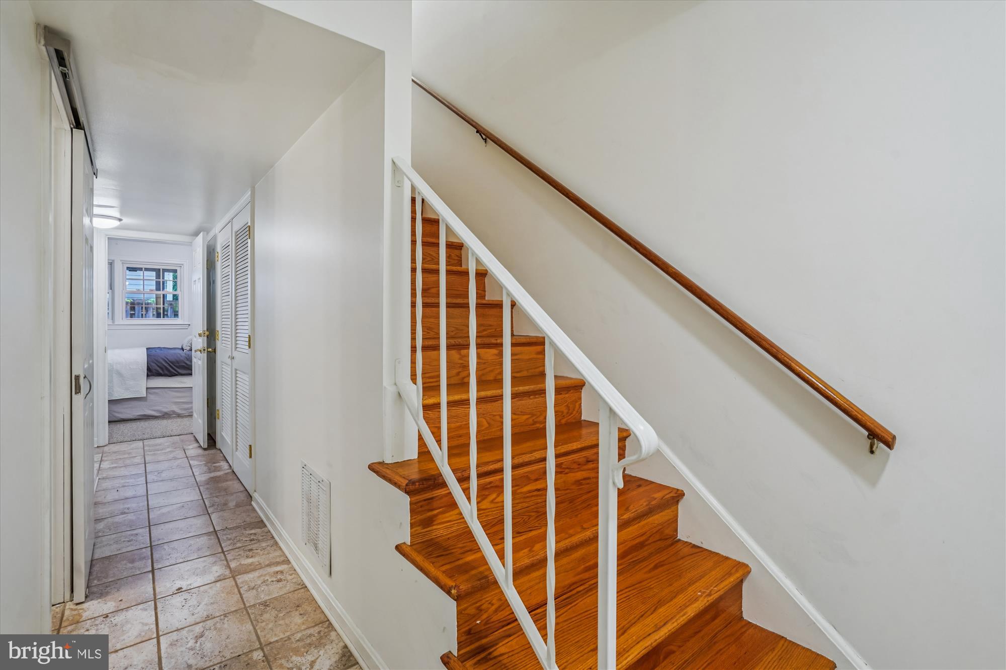24 South Abingdon Street Arlington, VA 22204 - Photo 33 of 66 a view of a hallway with wooden floor and entryway