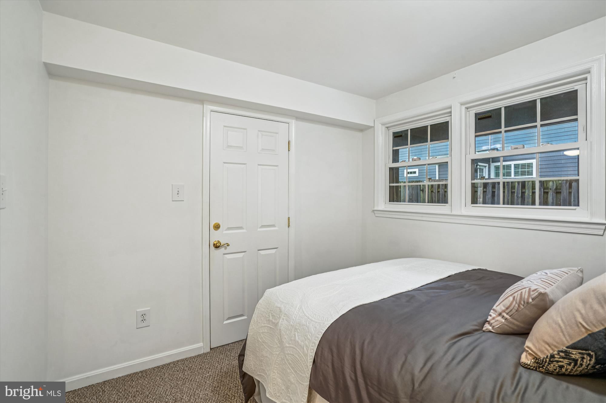24 South Abingdon Street Arlington, VA 22204 - Photo 35 of 66 a bedroom with a bed and a window