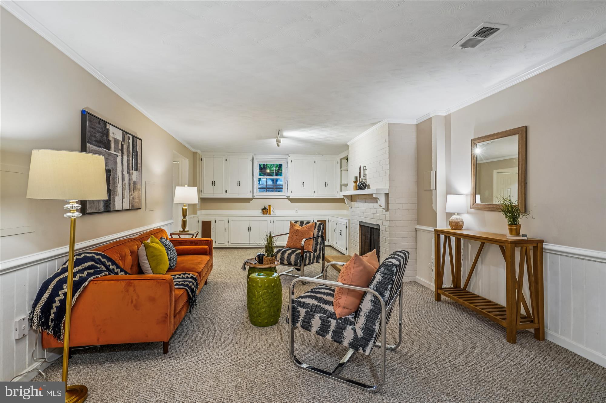 24 South Abingdon Street Arlington, VA 22204 - Photo 41 of 66 a living room with furniture and a dining table
