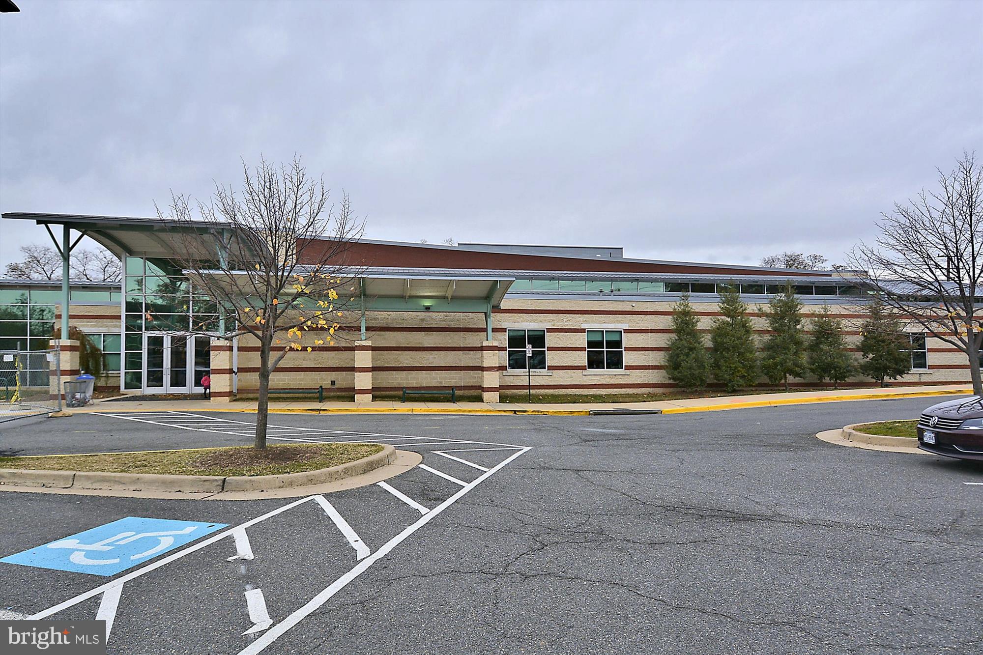 24 South Abingdon Street Arlington, VA 22204 - Photo 56 of 66 a view of a swimming pool with an outdoor seating and house in the background
