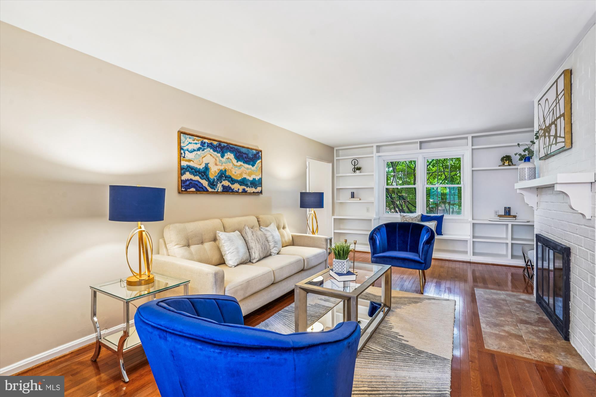 24 South Abingdon Street Arlington, VA 22204 - Photo 6 of 66 a living room with furniture a fireplace and a large window