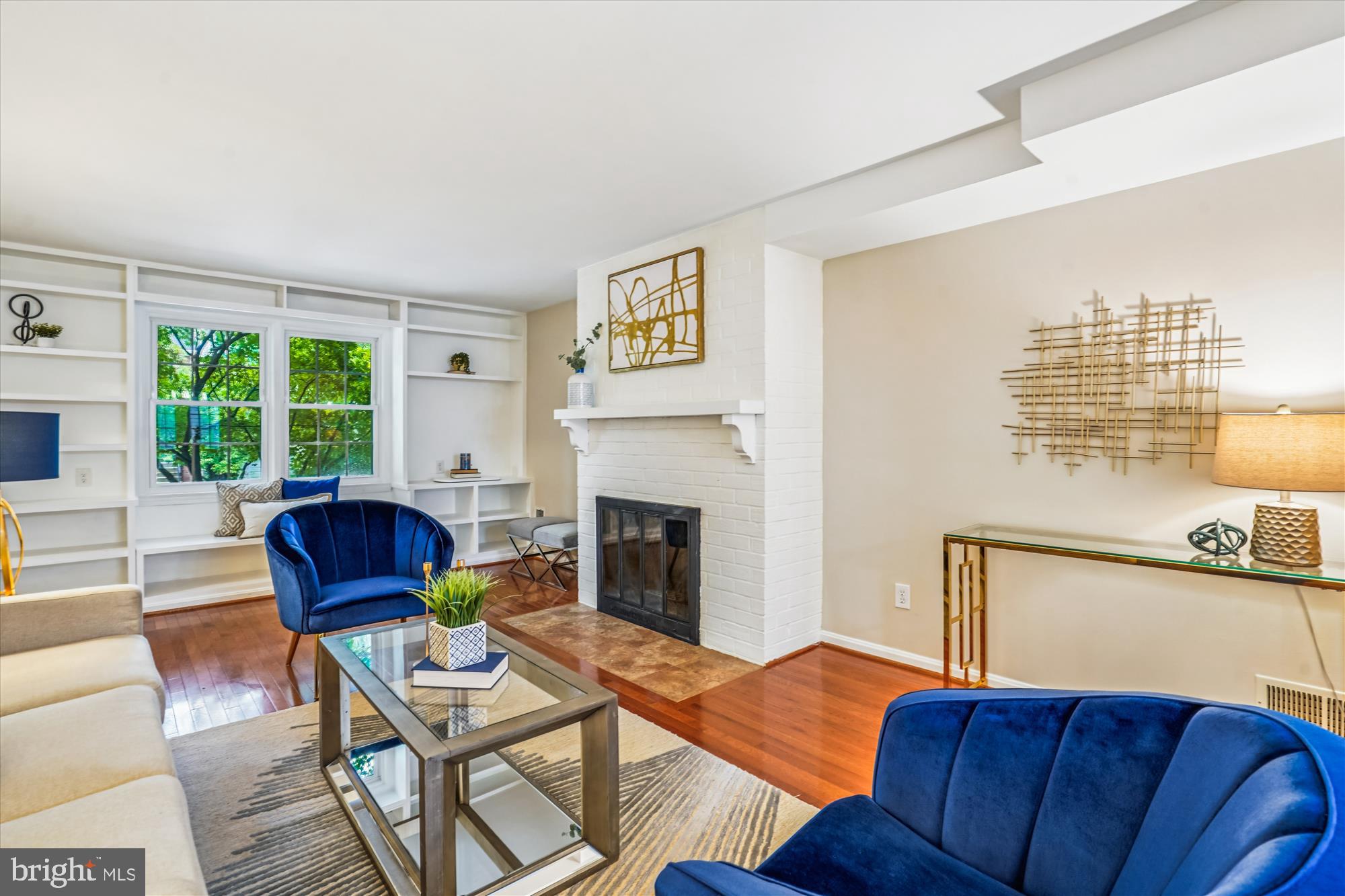 24 South Abingdon Street Arlington, VA 22204 - Photo 7 of 66 a living room with furniture and a fireplace