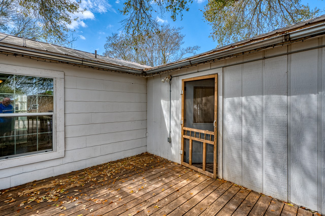 609 Dickson Street Lexington, TX 78947 - Photo 23 of 36 a view of a house with a wooden door