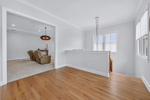 a spacious bedroom with a bed and a couch