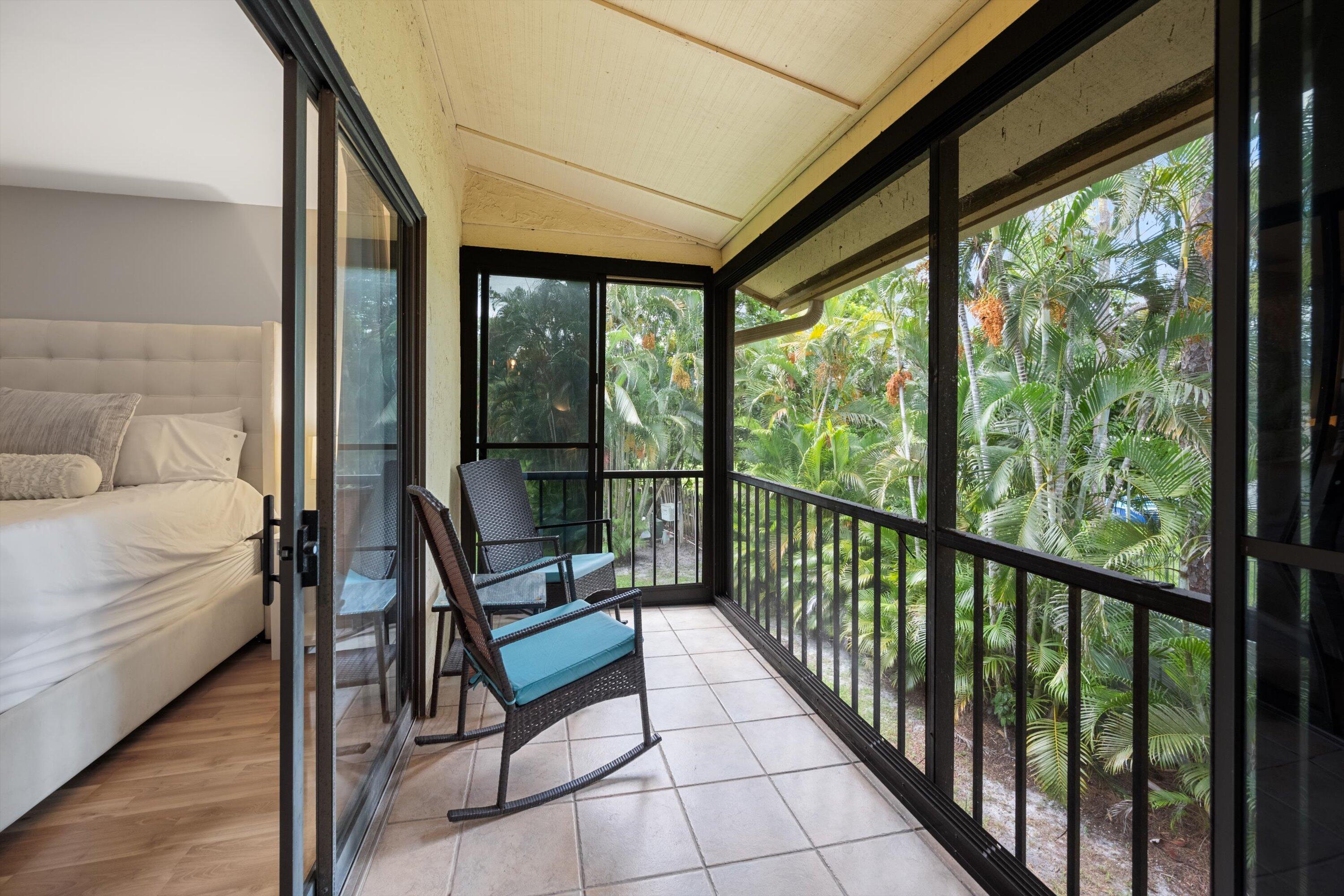 12970 Dartford Trail, Unit 4 Wellington, FL 33414 - Photo 19 of 23 a building outdoor space with seating