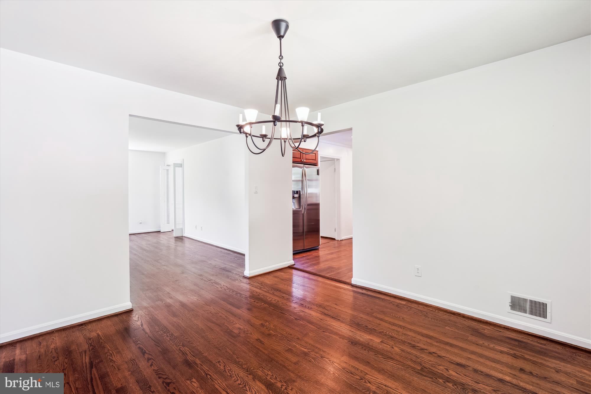 2445 Parallel Lane Silver Spring, MD 20904 - Photo 18 of 82 a view of a room with wooden floor closet and a ceiling fan