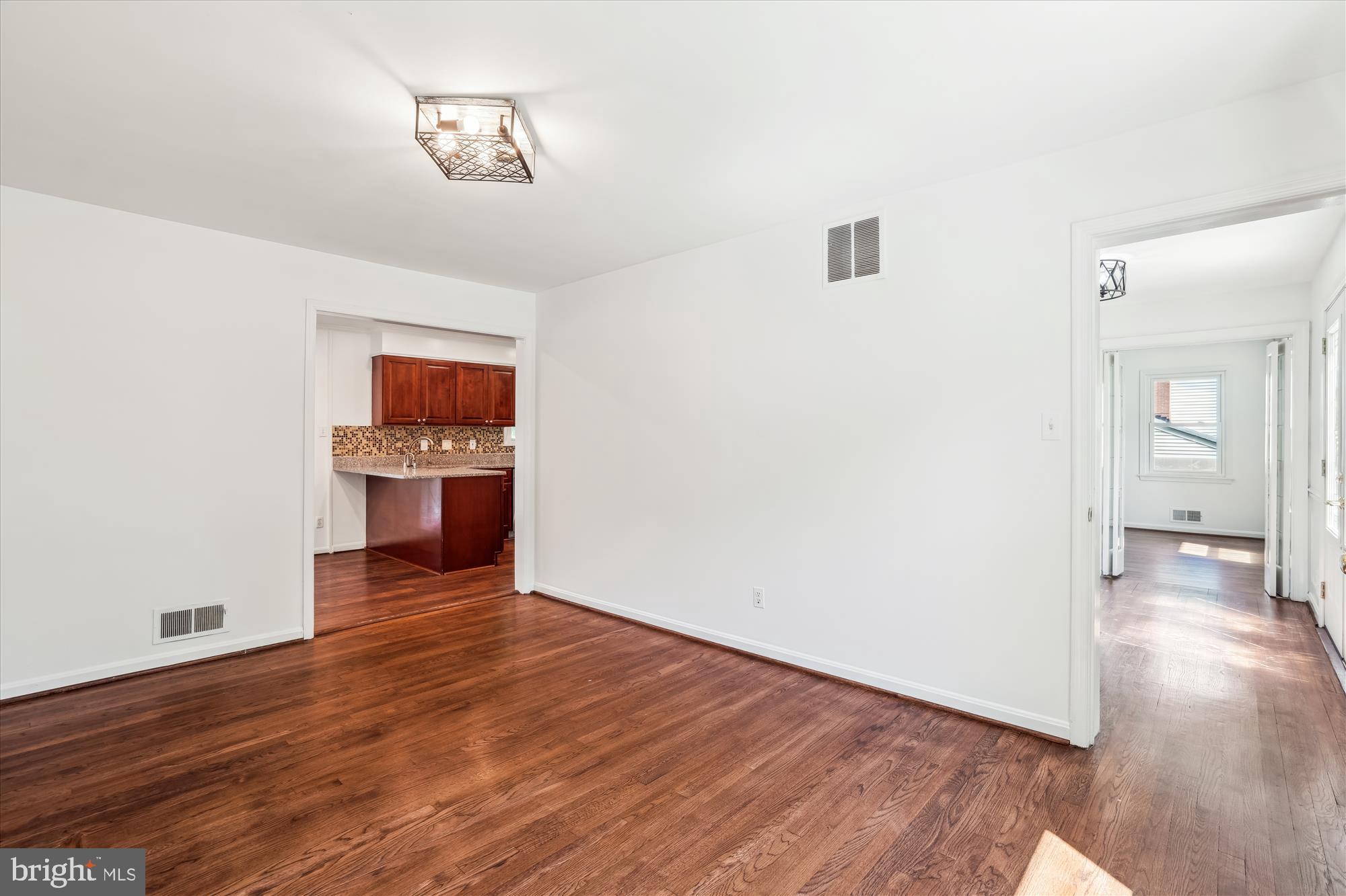 2445 Parallel Lane Silver Spring, MD 20904 - Photo 24 of 82 a view of empty room with wooden floor