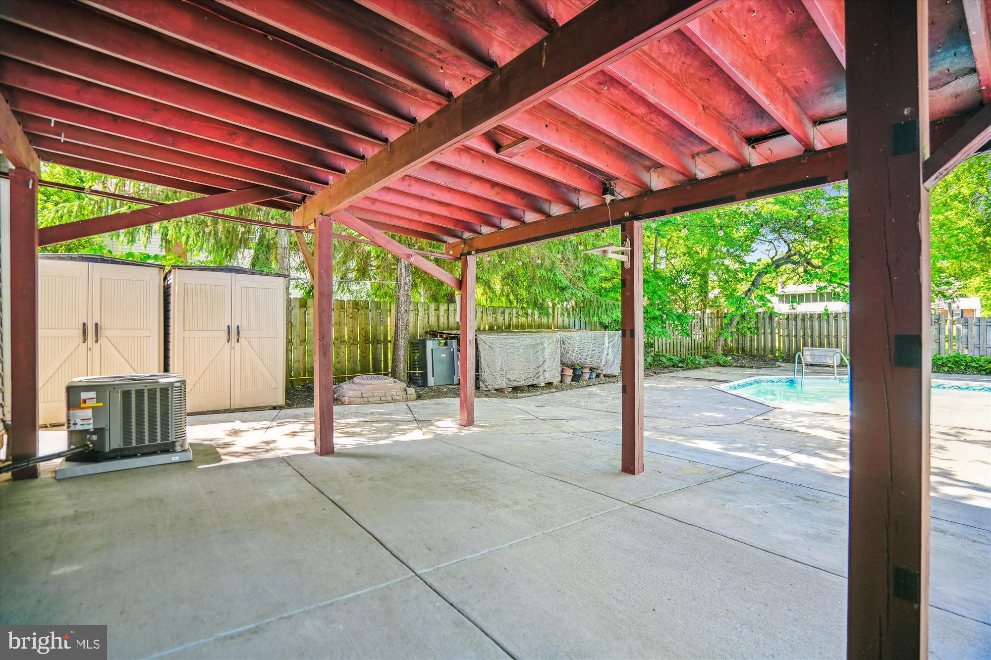 2445 Parallel Lane Silver Spring, MD 20904 - Photo 30 of 82 a backyard view of a house with table and chairs