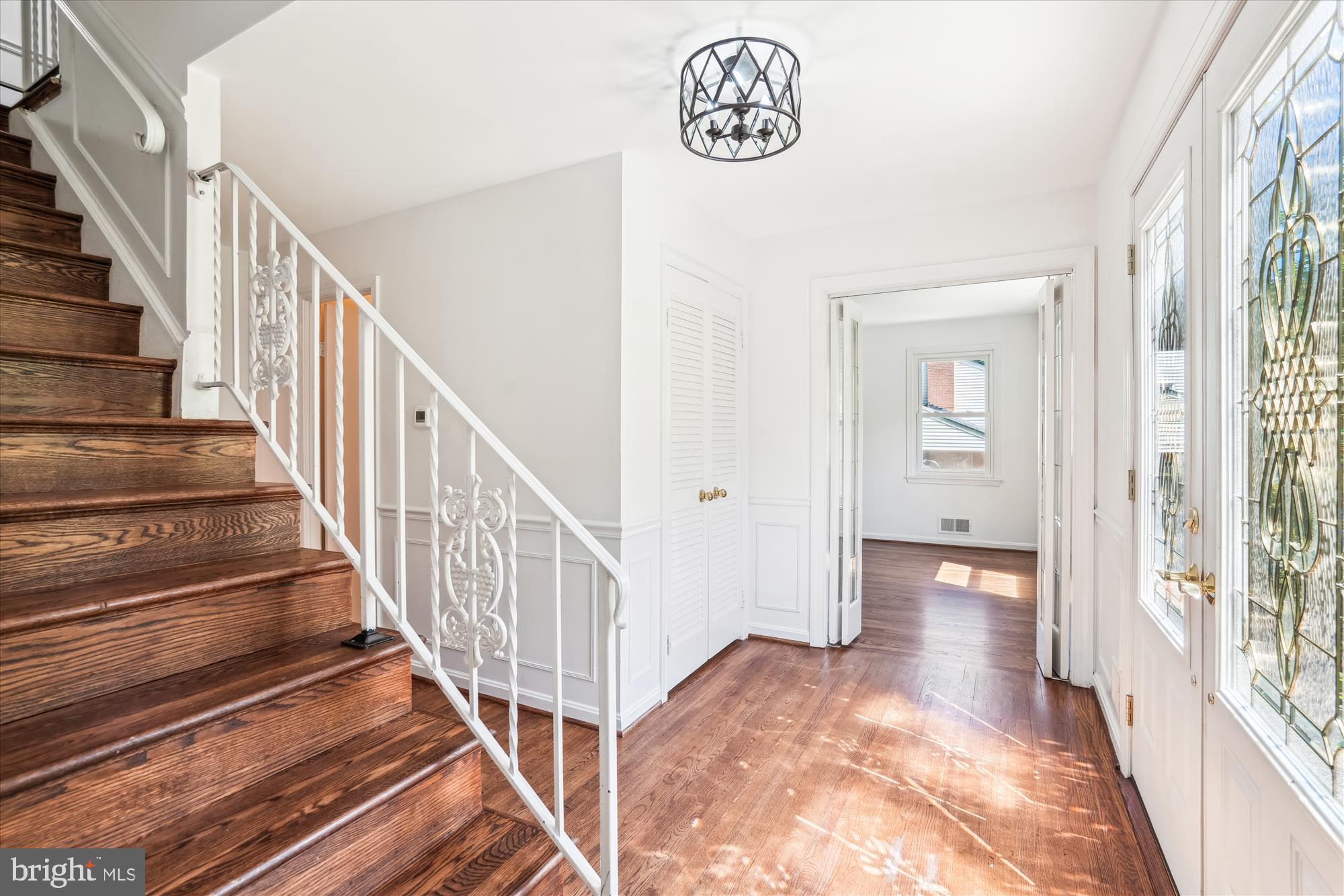 2445 Parallel Lane Silver Spring, MD 20904 - Photo 36 of 82 a view of a hallway with wooden floor and entryway